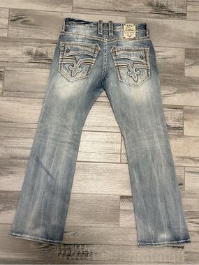 Rock Revival Men's Light Wash Bootcut Jeans with Embroidered Back Pockets